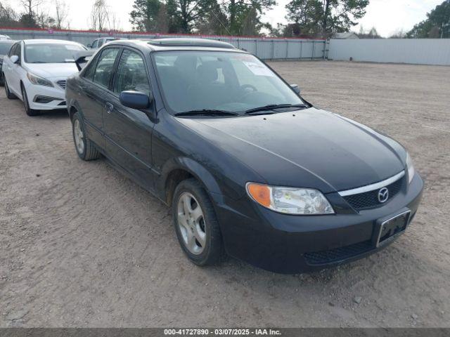  Salvage Mazda Protege
